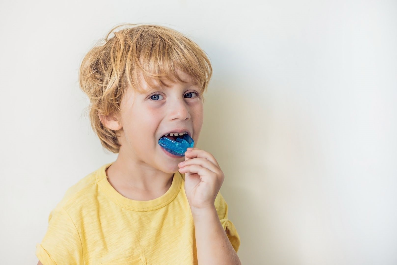 Little kid with mouthguard