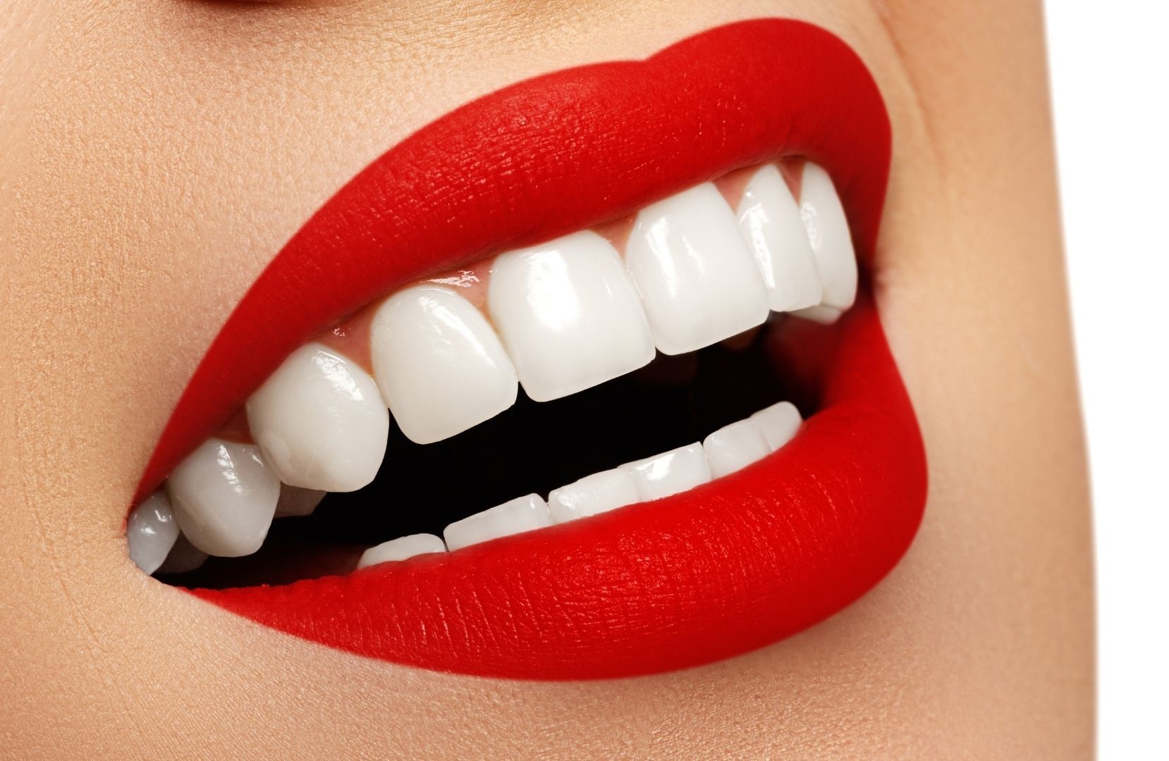 Red lipstick with white teeth